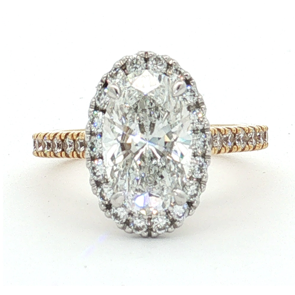 18ct Two-Tone Oval Lab Grown Diamond Halo Ring 18ct Two-Tone Oval Lab Grown Diamond Halo Ring